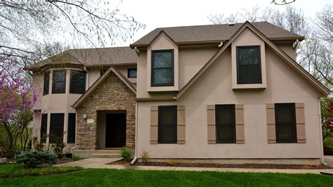 stucco house with metal roof|what is stucco exterior.